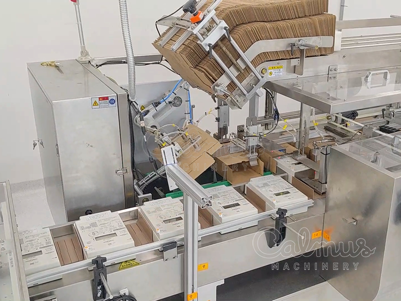 Kartonneermachine en casepacker voor elektriciteitsmeters