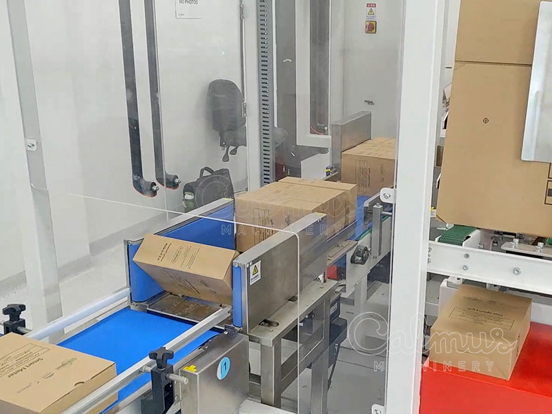 Kartons kantelen - Casepacker voor elektriciteitsmeters