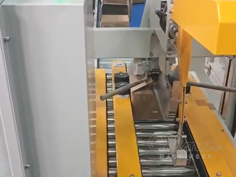 Герметизация коробок - Массовая упаковка хлебных булочек в коробки