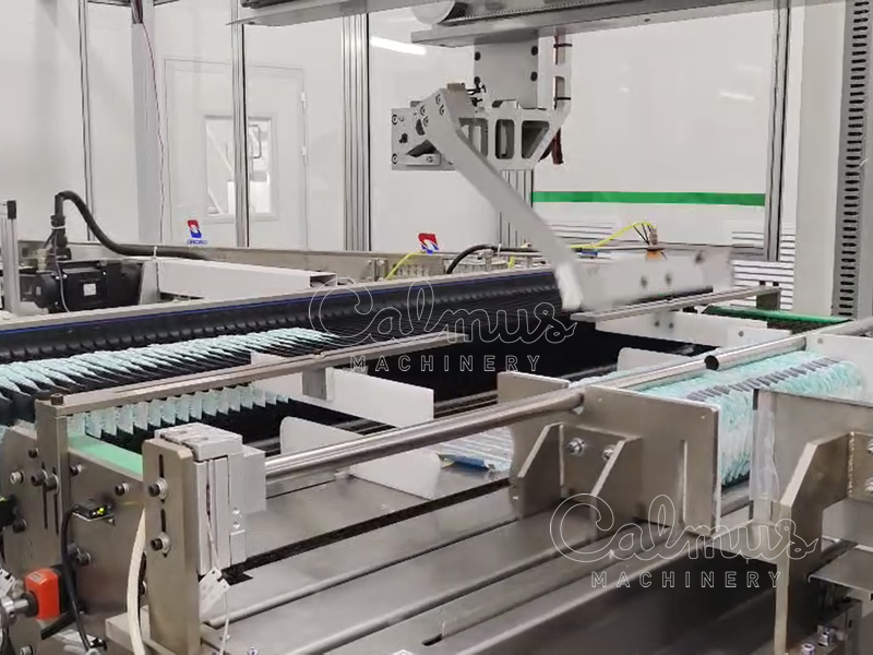 Проталкивание подгузников - Упаковочно-пакетирующая-машина