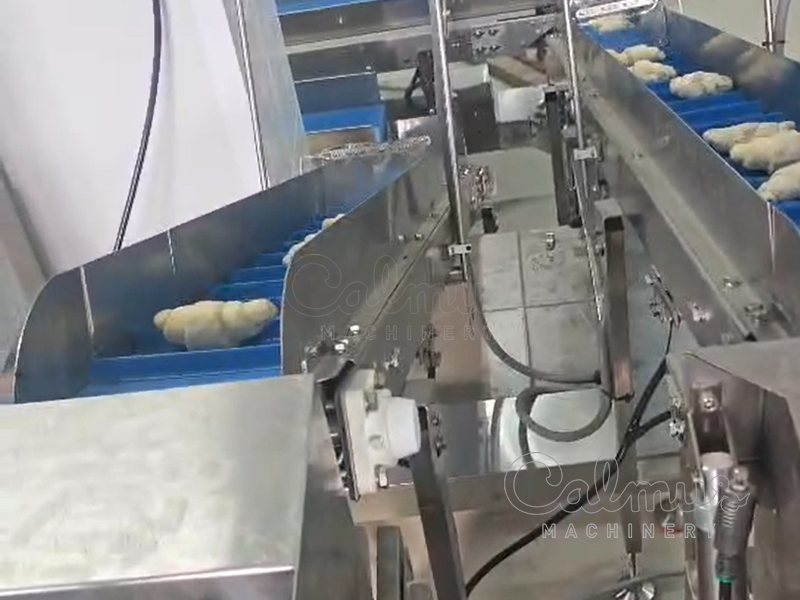 Конвейерные дозаторы - Массовая упаковка хлебных булочек в коробки